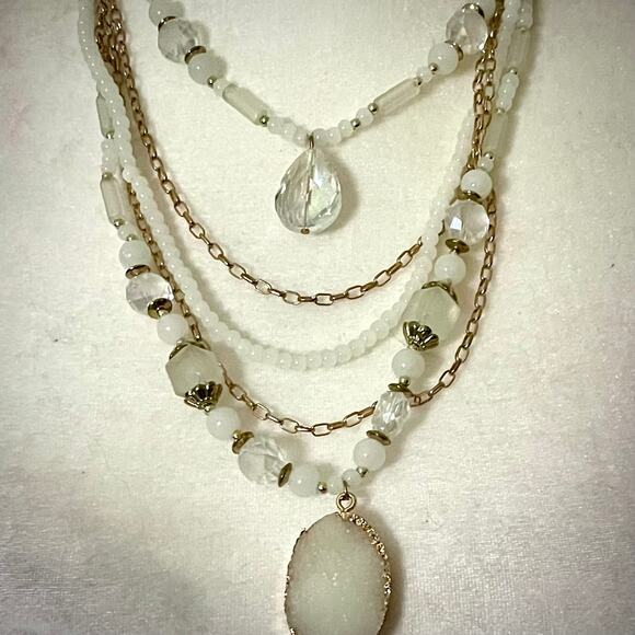 Multilayered Multistrand White and Gold Tone Tassel Pendant Necklace - Picture 2 of 3